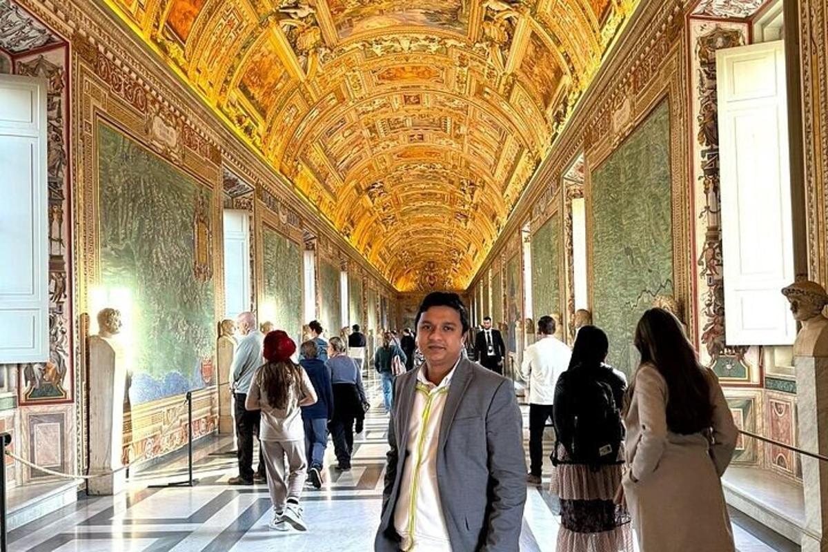 a man standing in a hallway in a museum