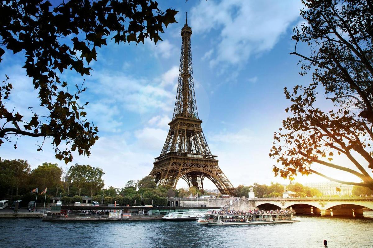 a view of the eiffel tower from the river