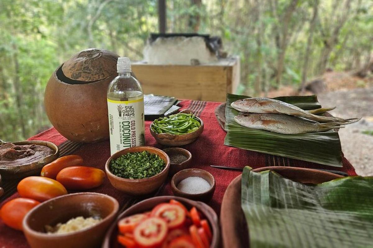 a table topped with bowls of vegetables and a bottle of water