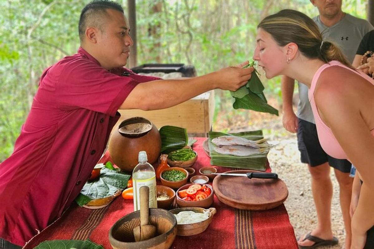 a woman feeding a woman food at a table