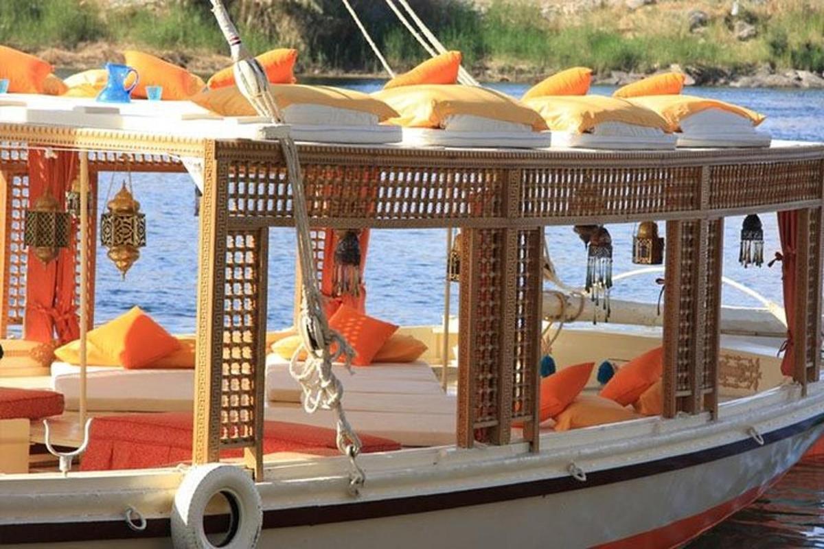 a boat with lots of pillows on the water