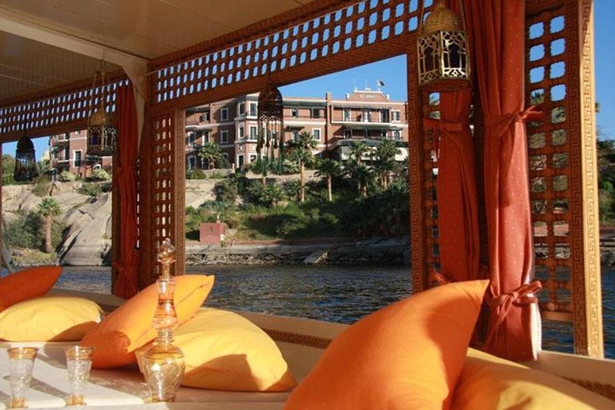 a room with a window with a view of the water