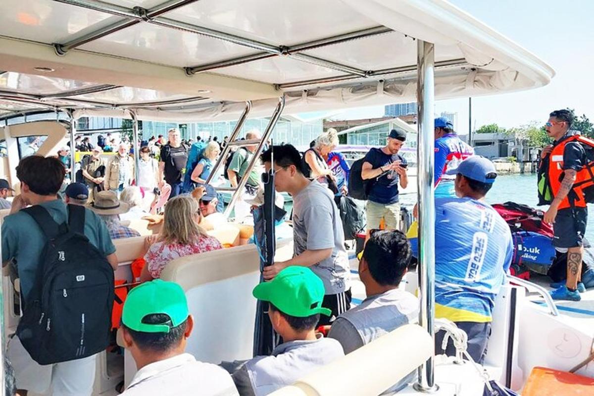 a group of people standing inside of a boat