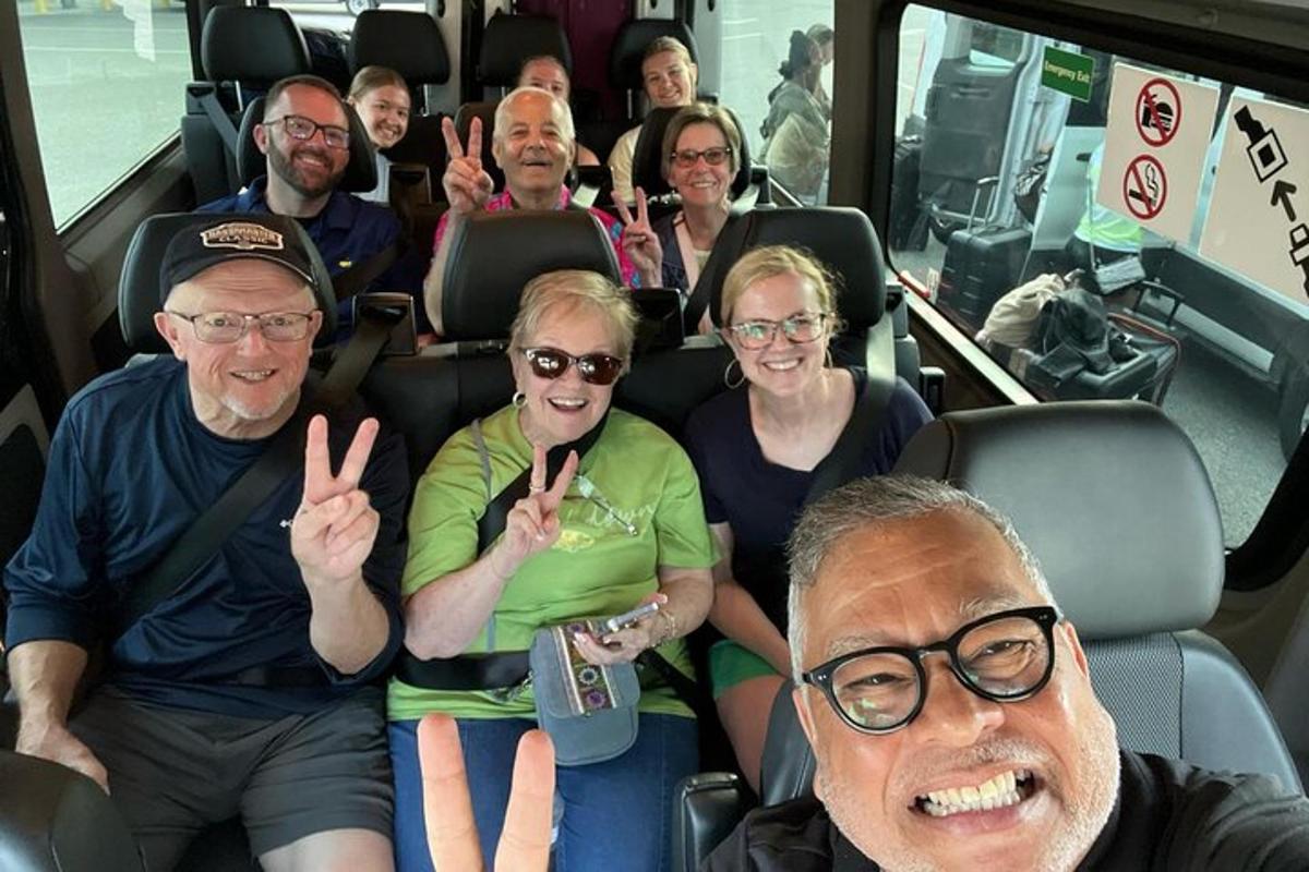 a group of people sitting in a bus