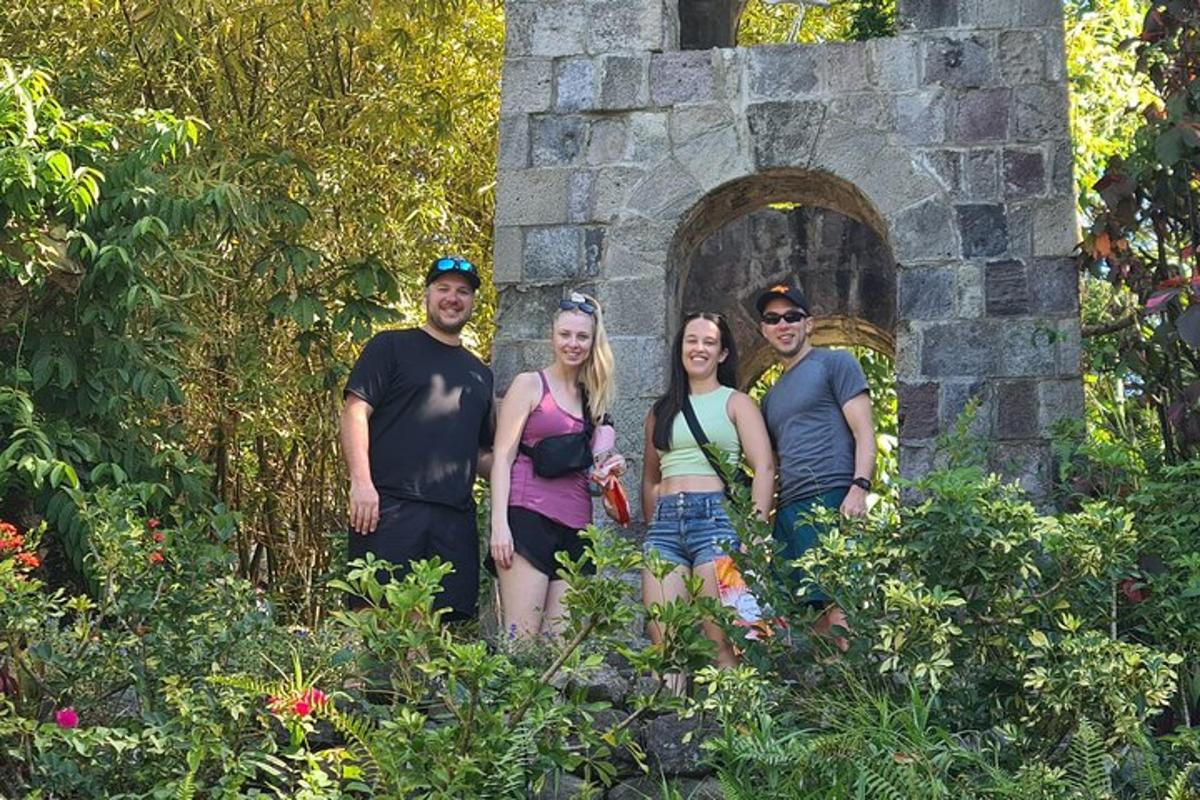 a group of people standing in a garden