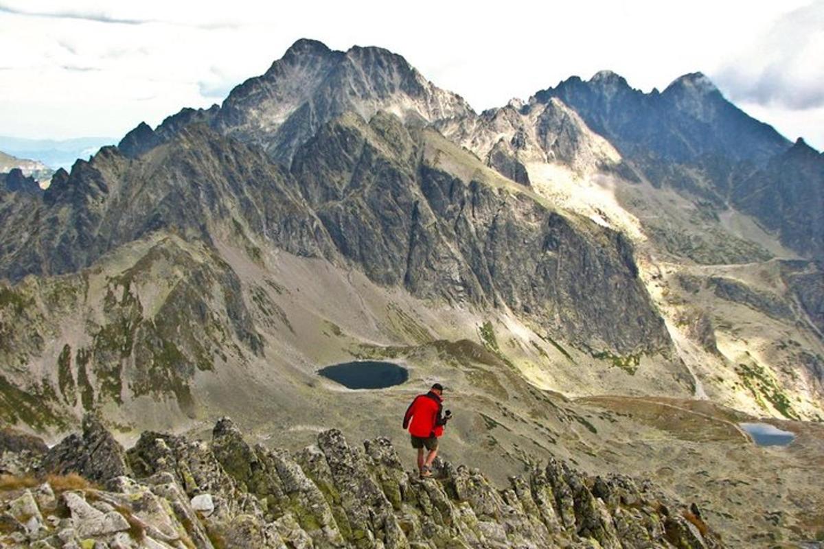 a man standing on top of a mountain
