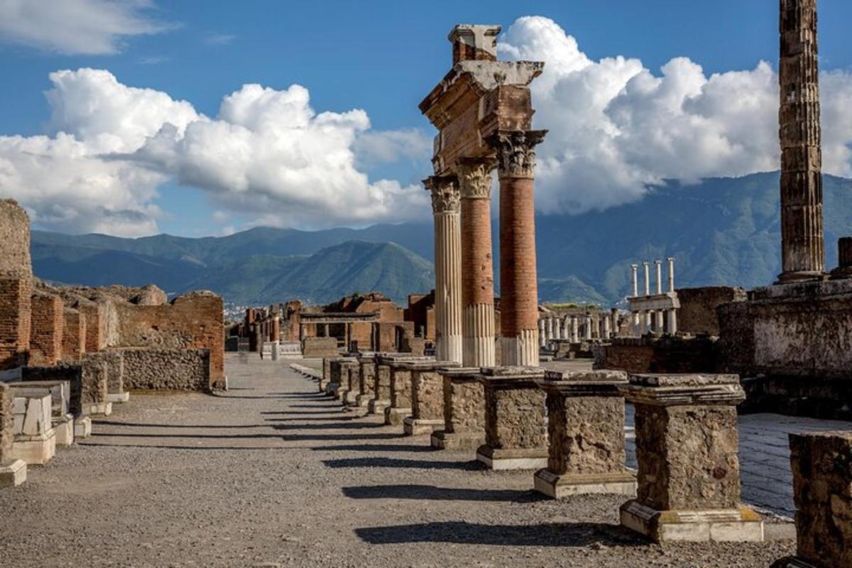 a row of columns and pillars in an ancient city