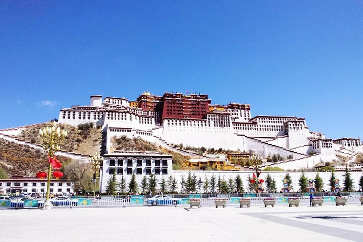 a large white building on top of a mountain