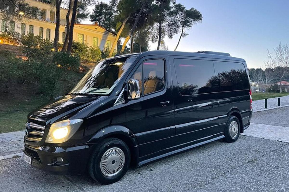 a black van parked on the side of a street