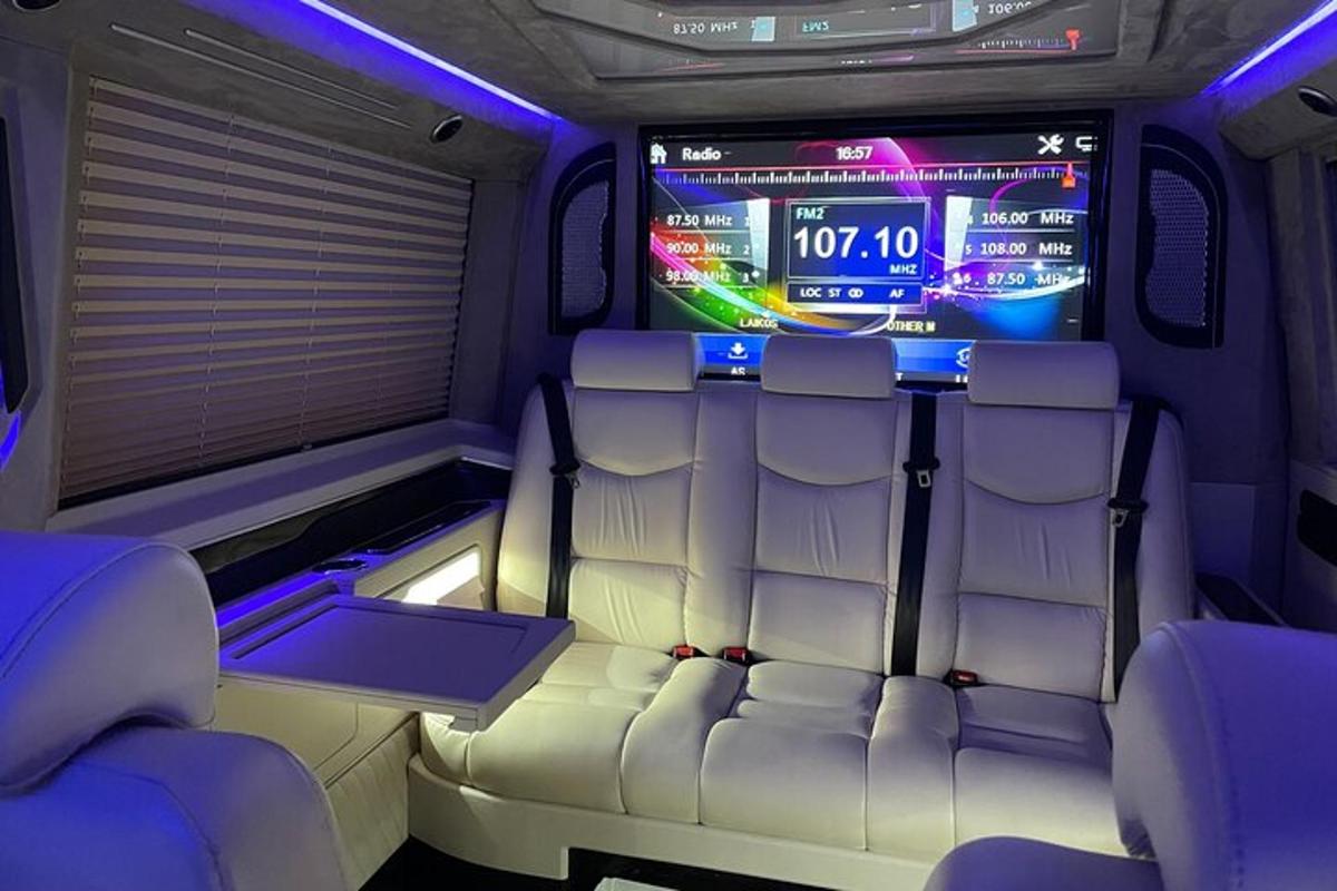 an interior of a limo with a slot machine