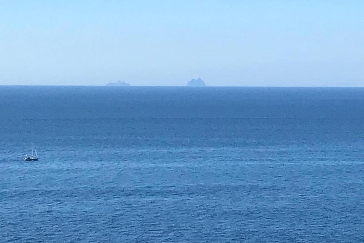 a boat in the middle of a large body of water