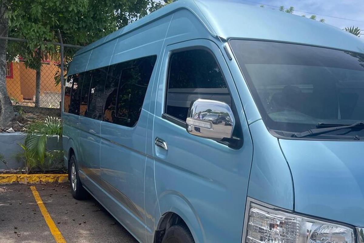 a blue van parked in a parking lot