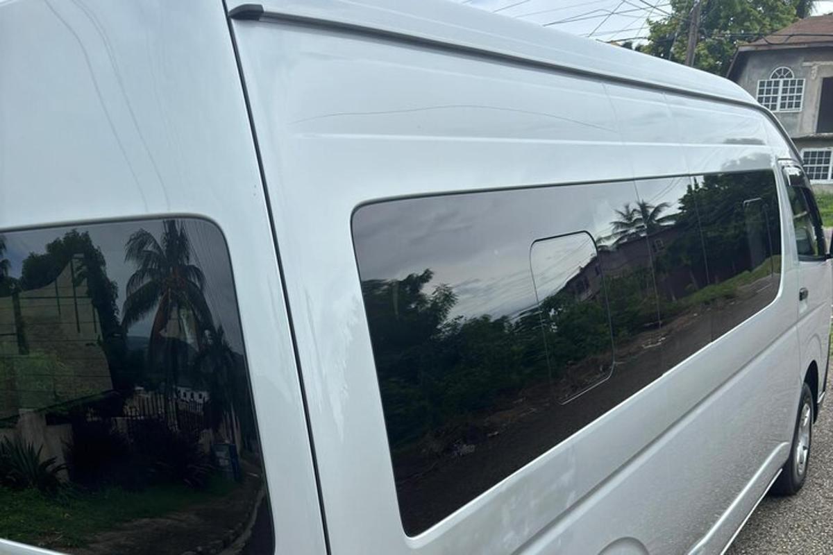 a white van parked in front of a house