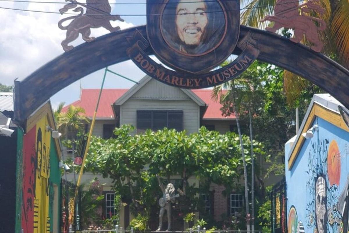 a sign for a mardi gras museum in front of a building