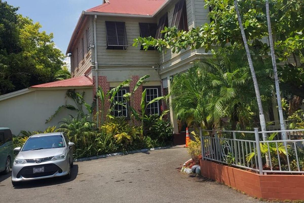 a car parked in front of a house