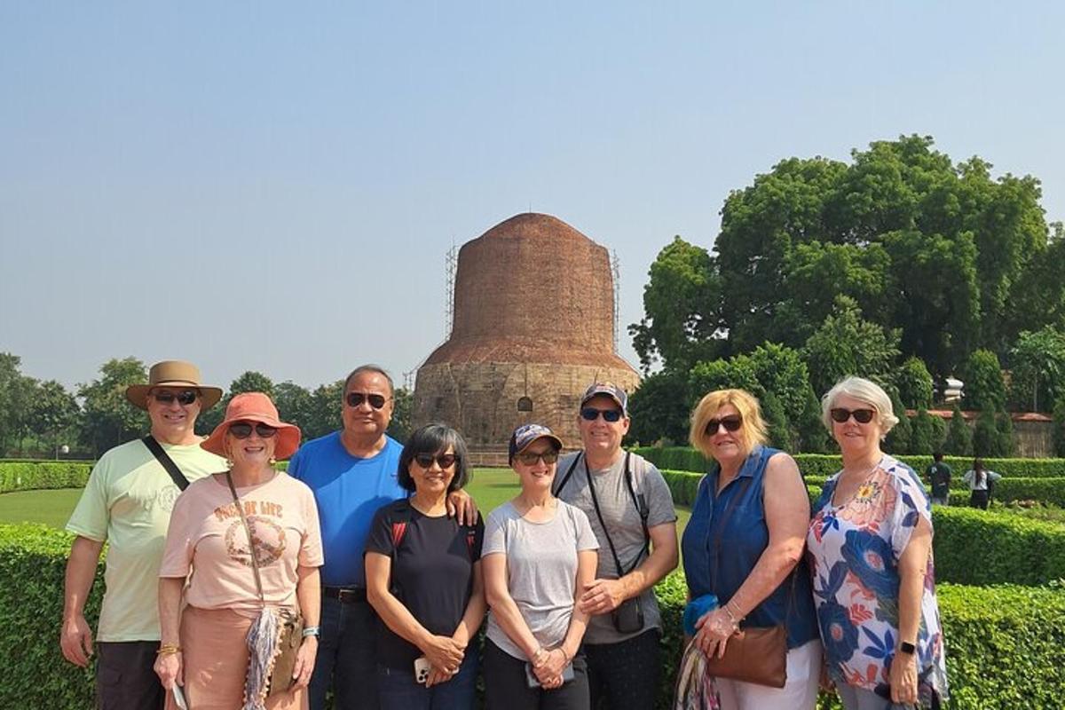 a group of people standing in front of a monument