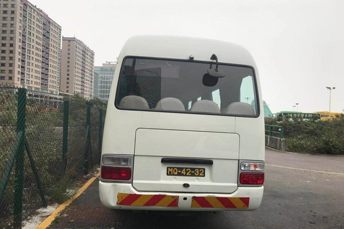 a white van parked on the side of a road