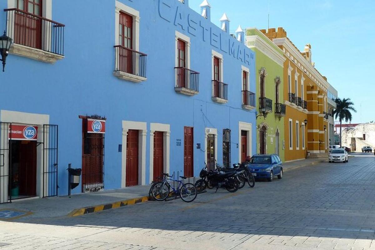 a blue building with bikes parked in front of it