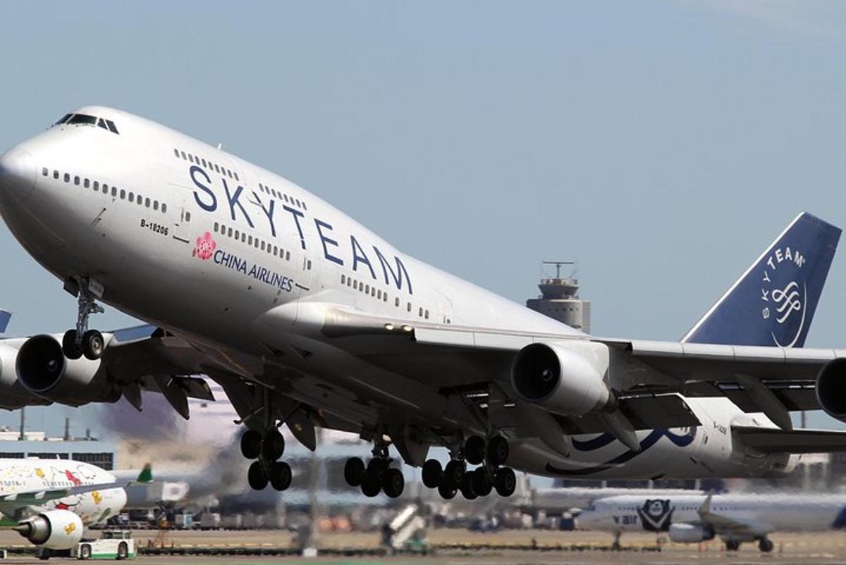 an airplane is taking off from an airport runway