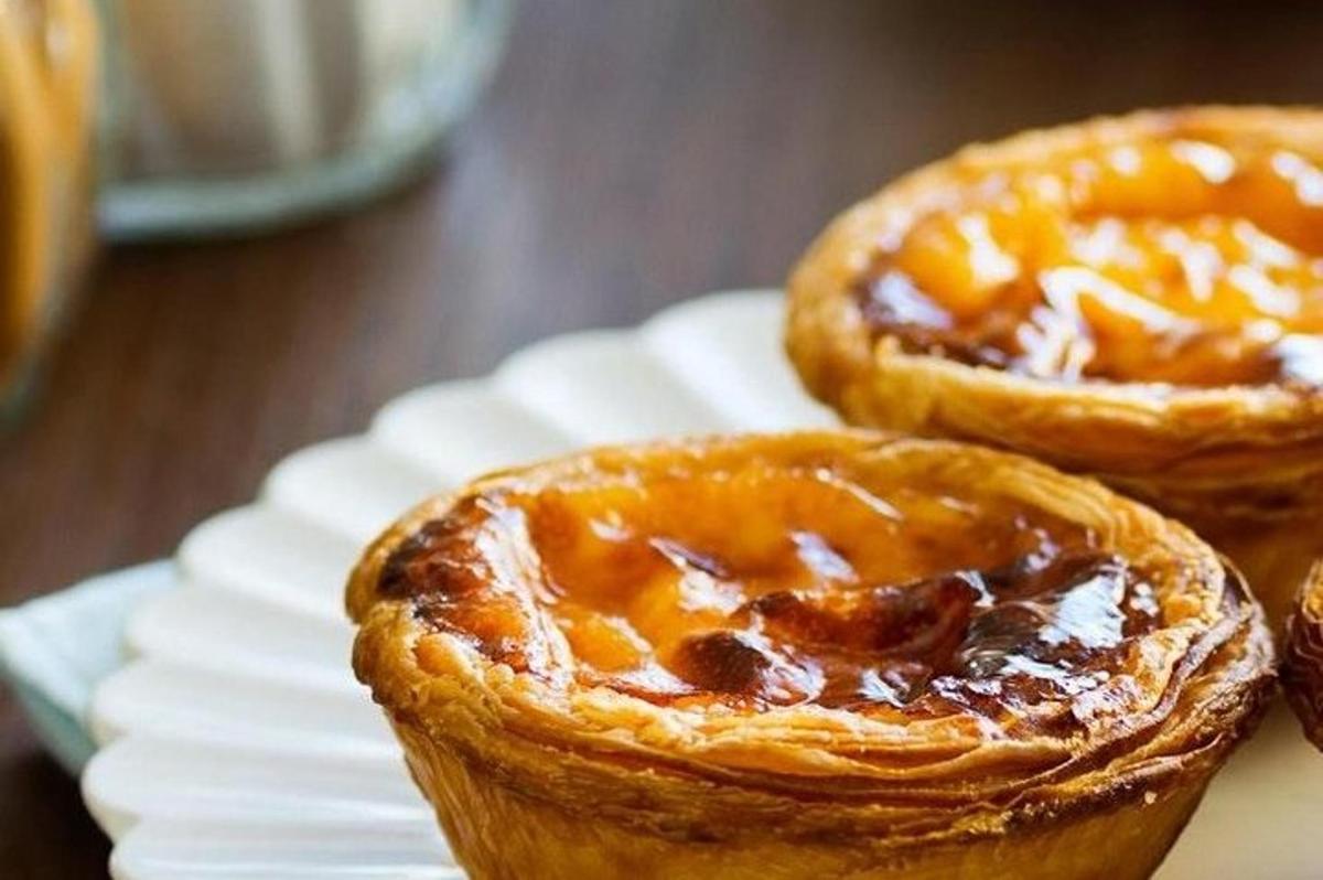 two pies sitting on top of a white plate
