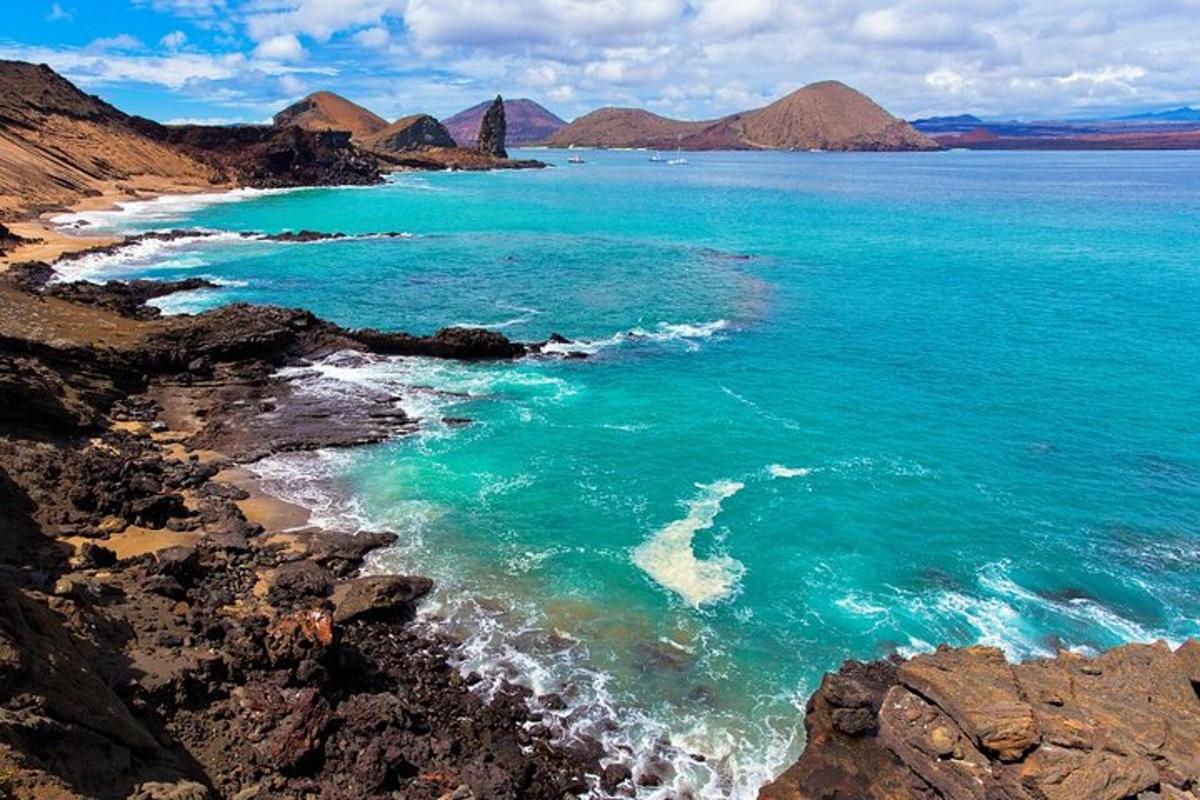 a view of the ocean with mountains in the background
