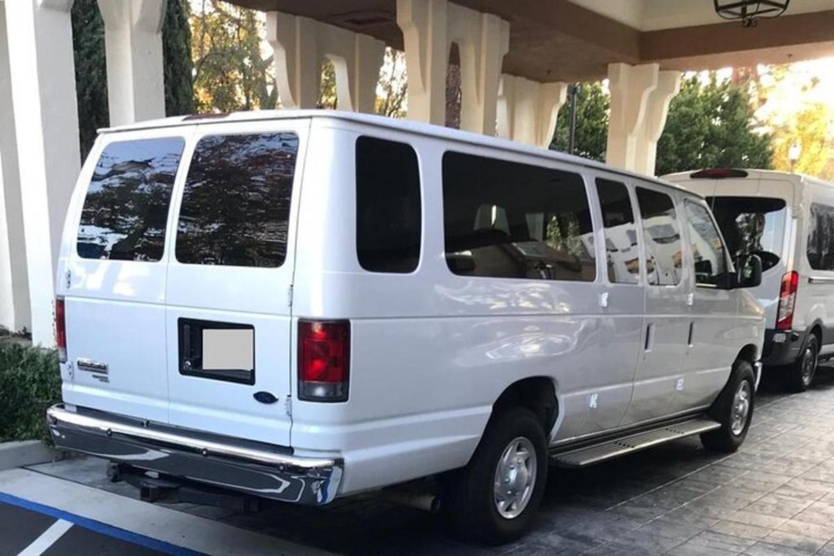 a white van parked in a parking lot