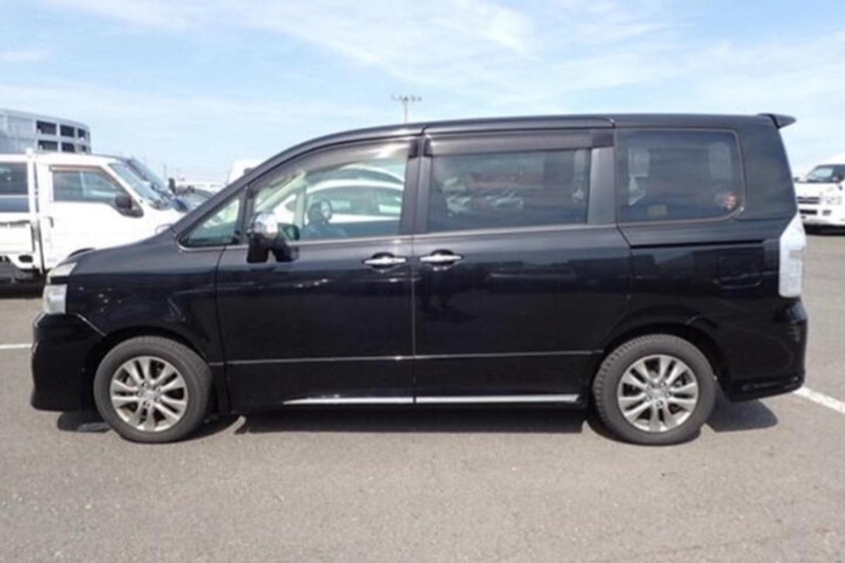 a black van parked in a parking lot