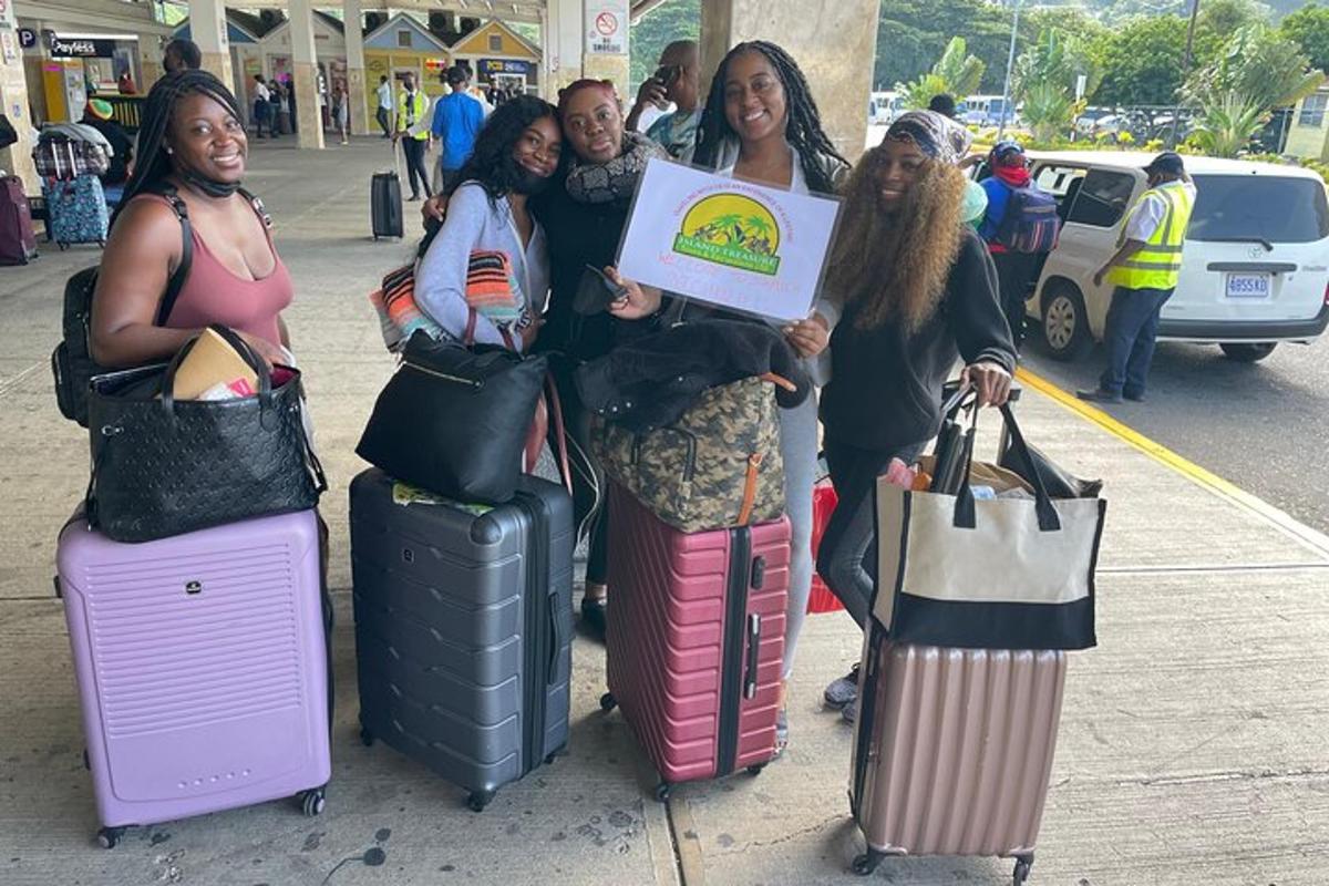 a group of people standing on their luggage