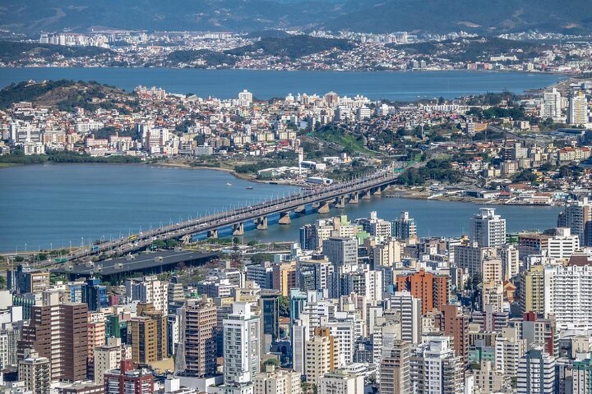 a large city with a bridge over a body of water