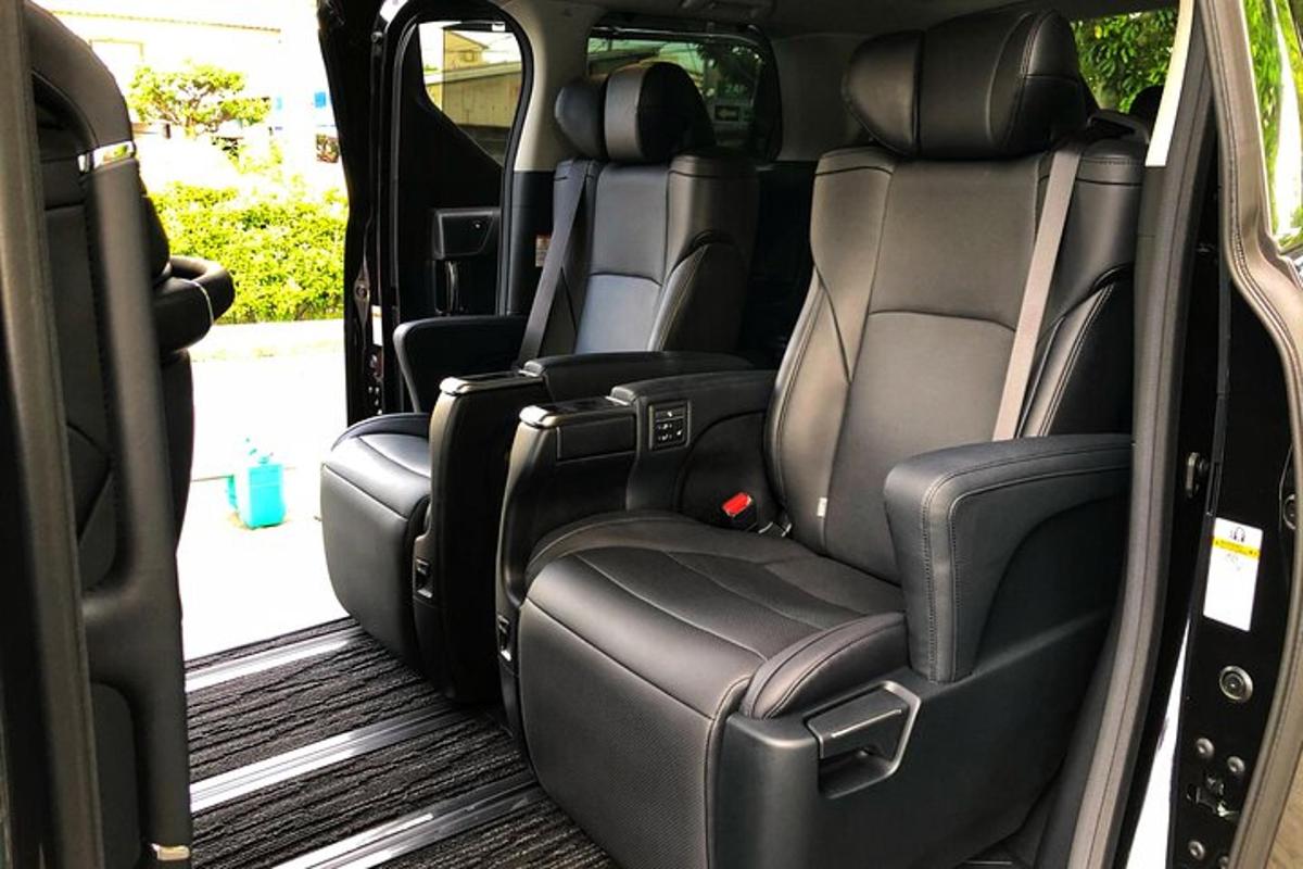 an open back seat of a minivan with the back seats folded