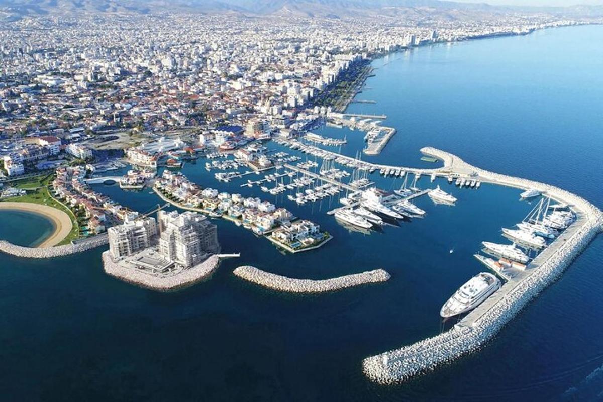 an aerial view of a harbor with boats in the water