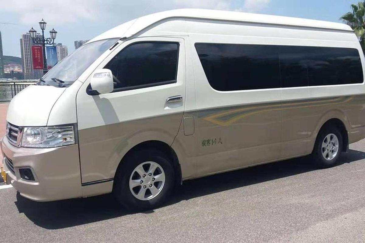 a white van is parked in a parking lot
