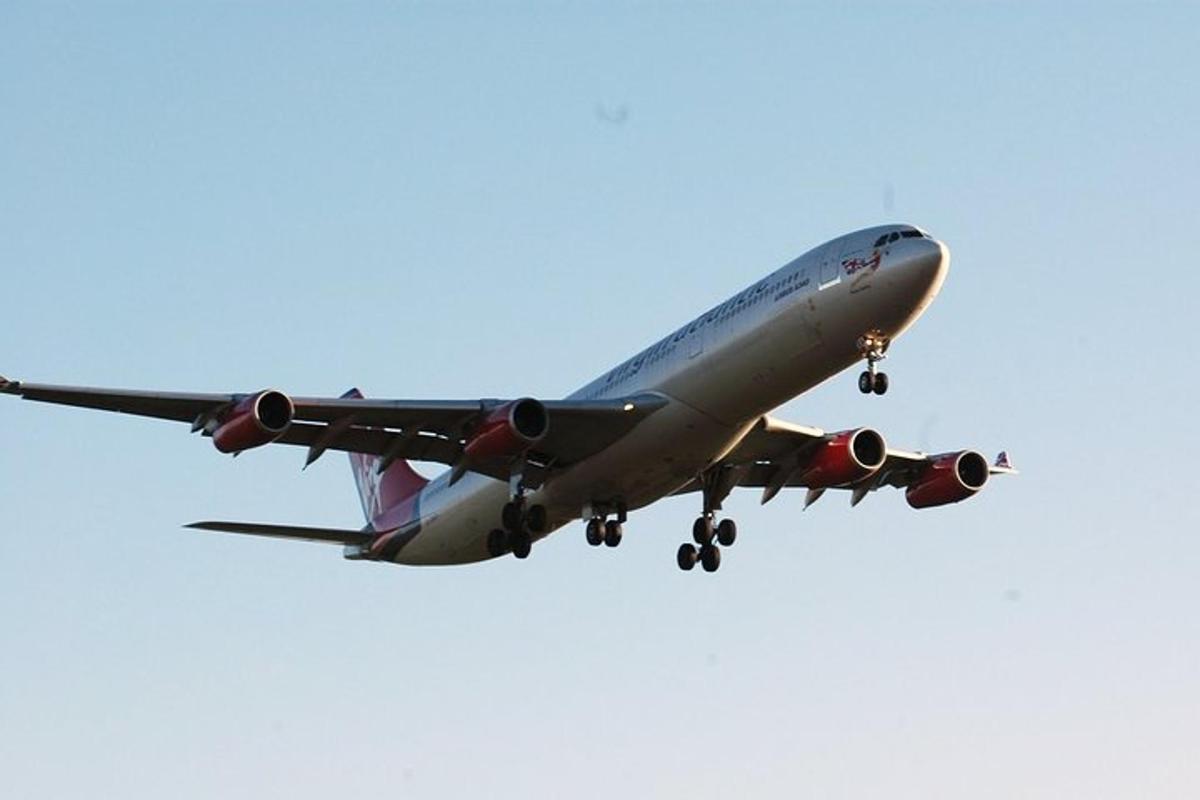 an airplane is flying in the sky