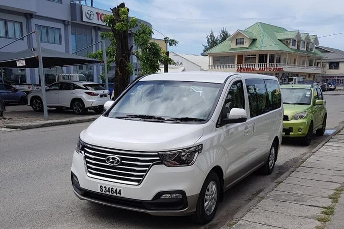 a white van parked on the side of a street