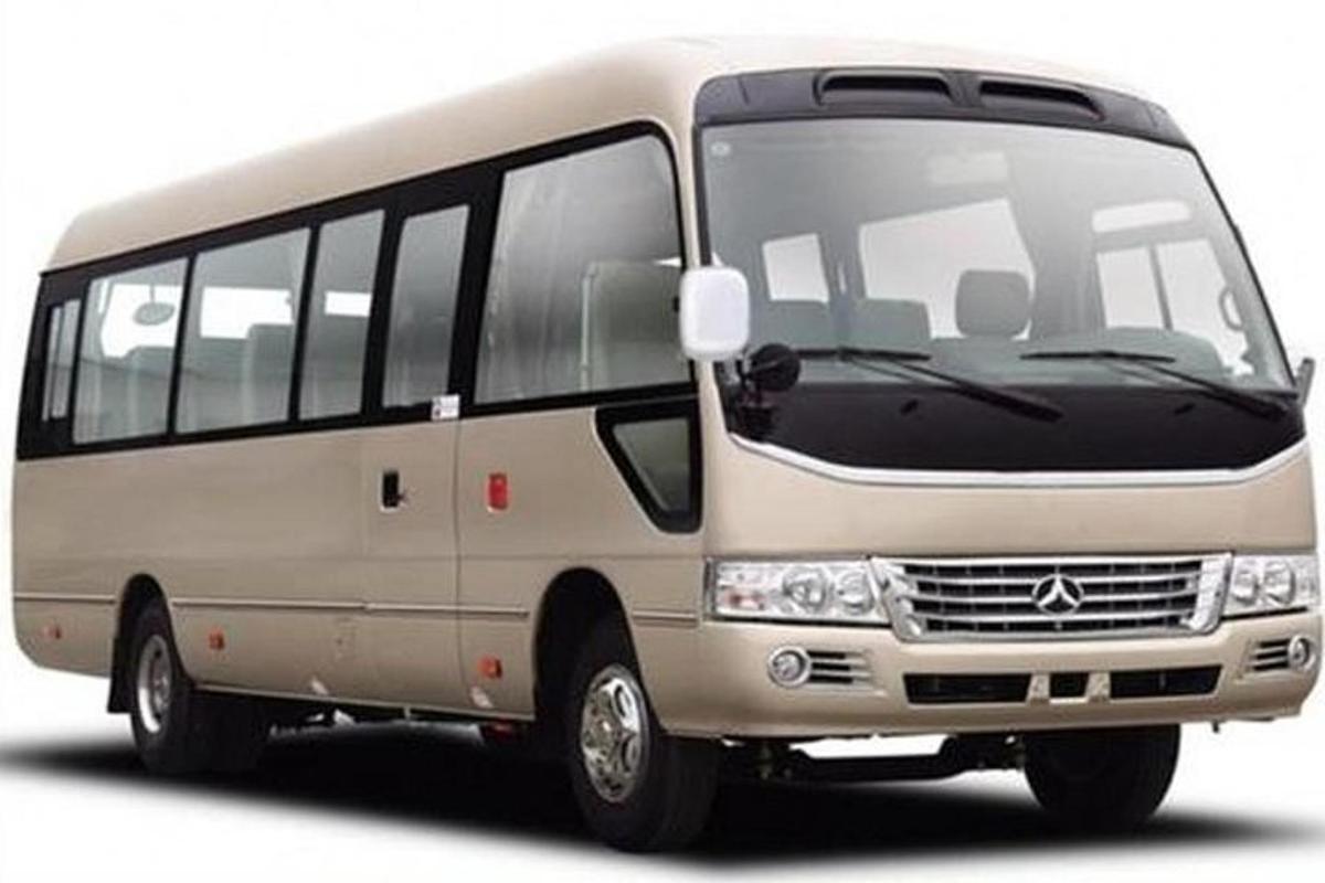 a white bus is shown on a white background