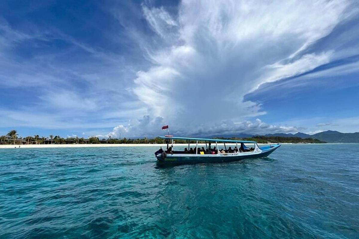a group of people on a boat in the water