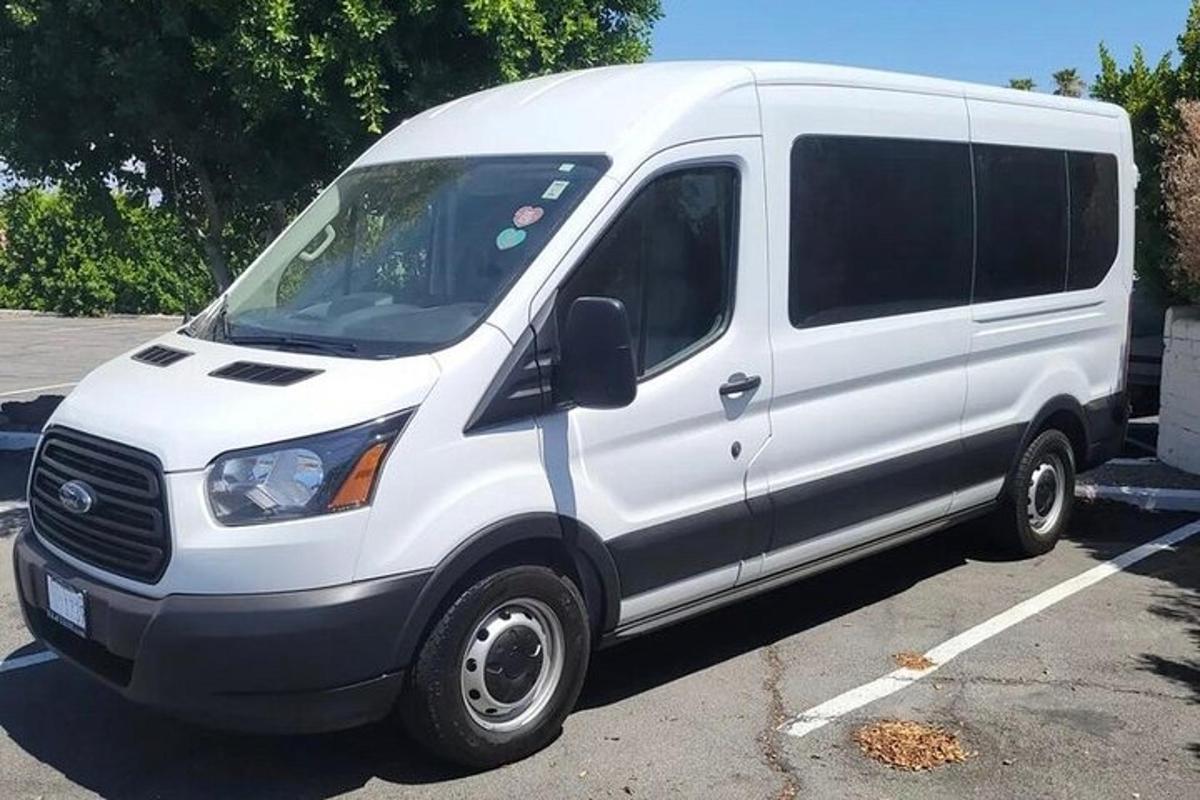 a white van parked in a parking lot