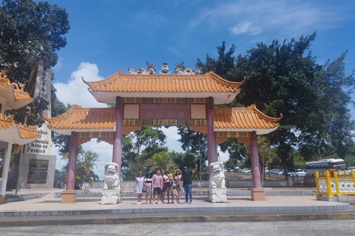 a group of people standing in a pavilion