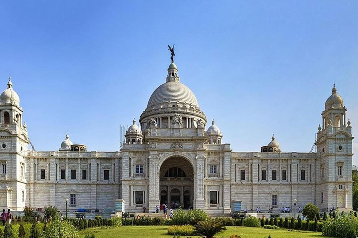 a large white building with a dome
