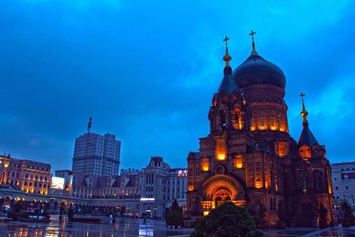 a large building with a dome on top at night