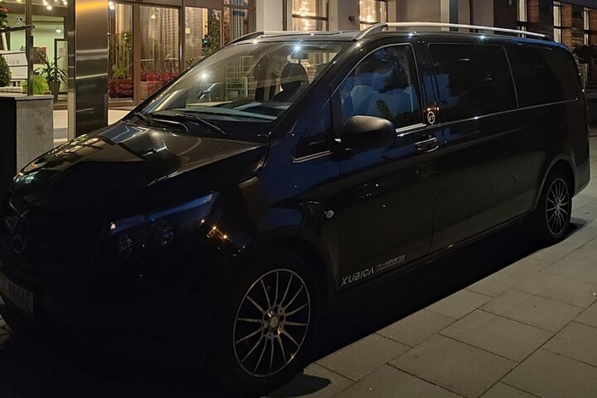 a black van parked on the side of a street