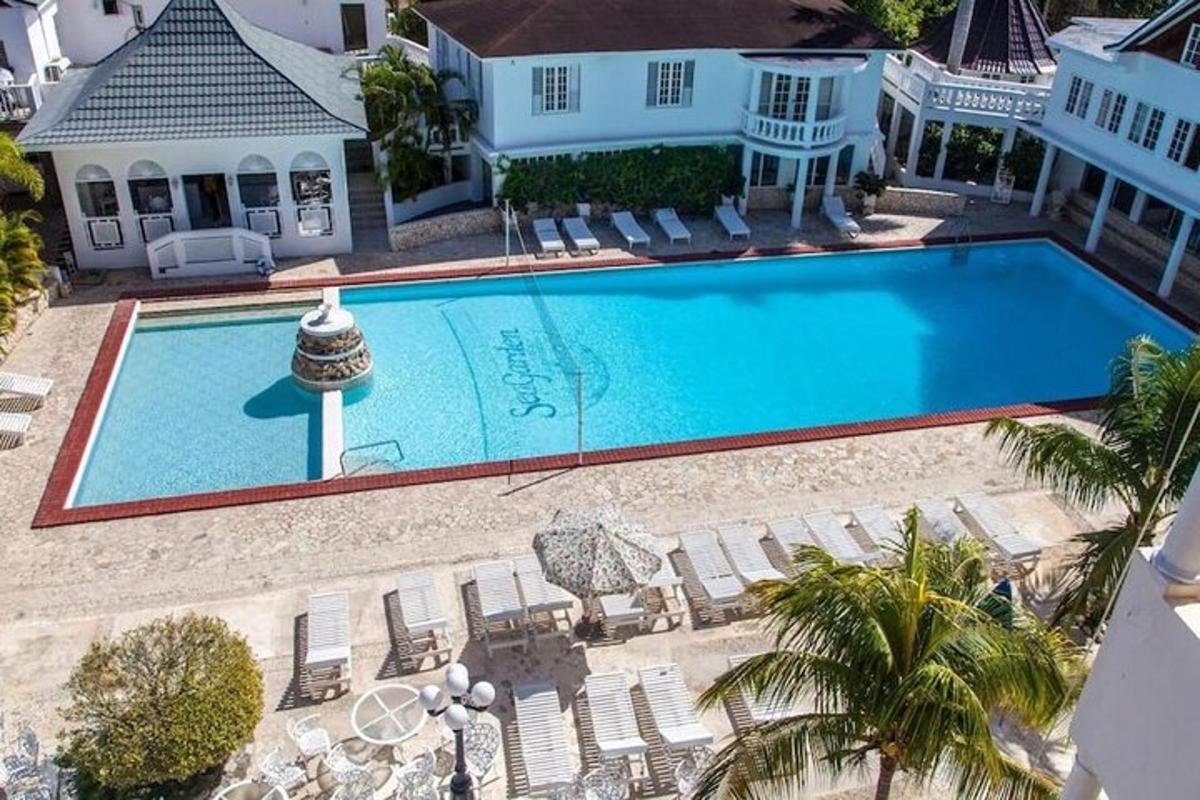 an overhead view of a swimming pool in a house