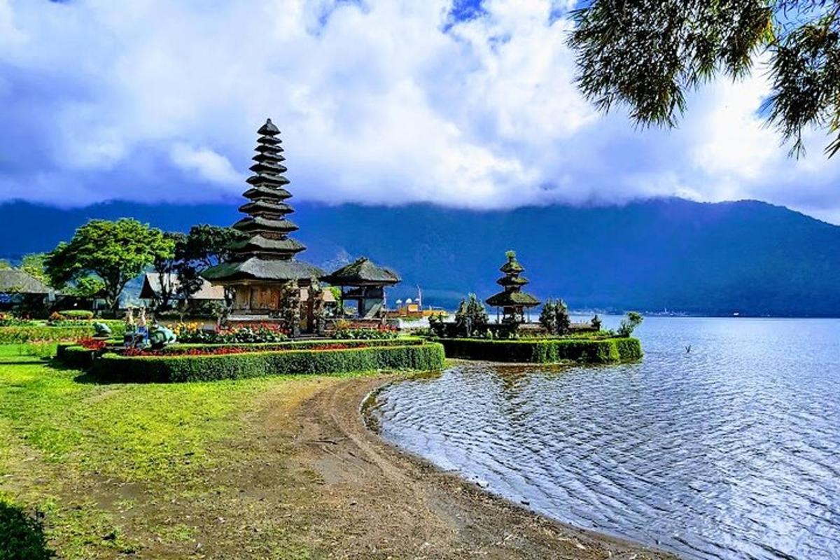 a lake with two towers in the middle of it