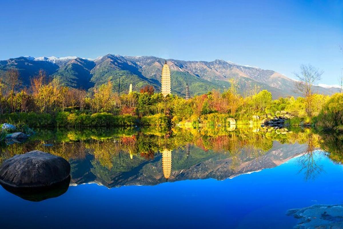 a reflection of a building in the water