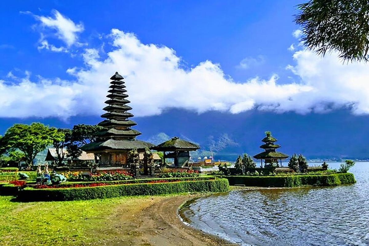 two pagodas in the middle of a body of water