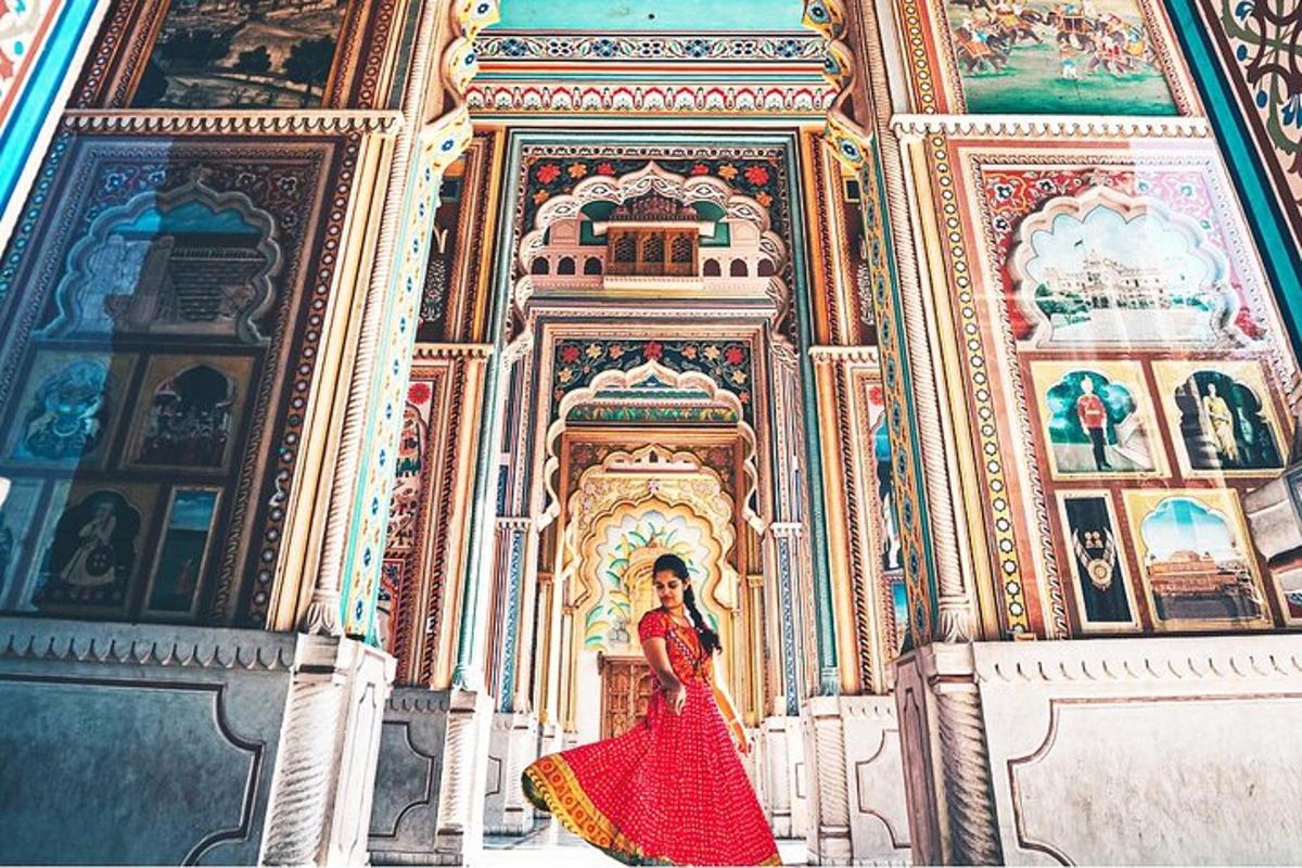 a woman in a red dress standing in a building