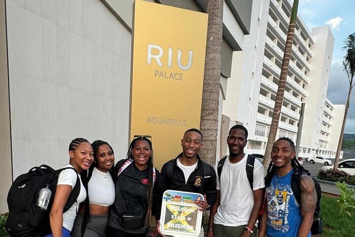 a group of people standing in front of a building