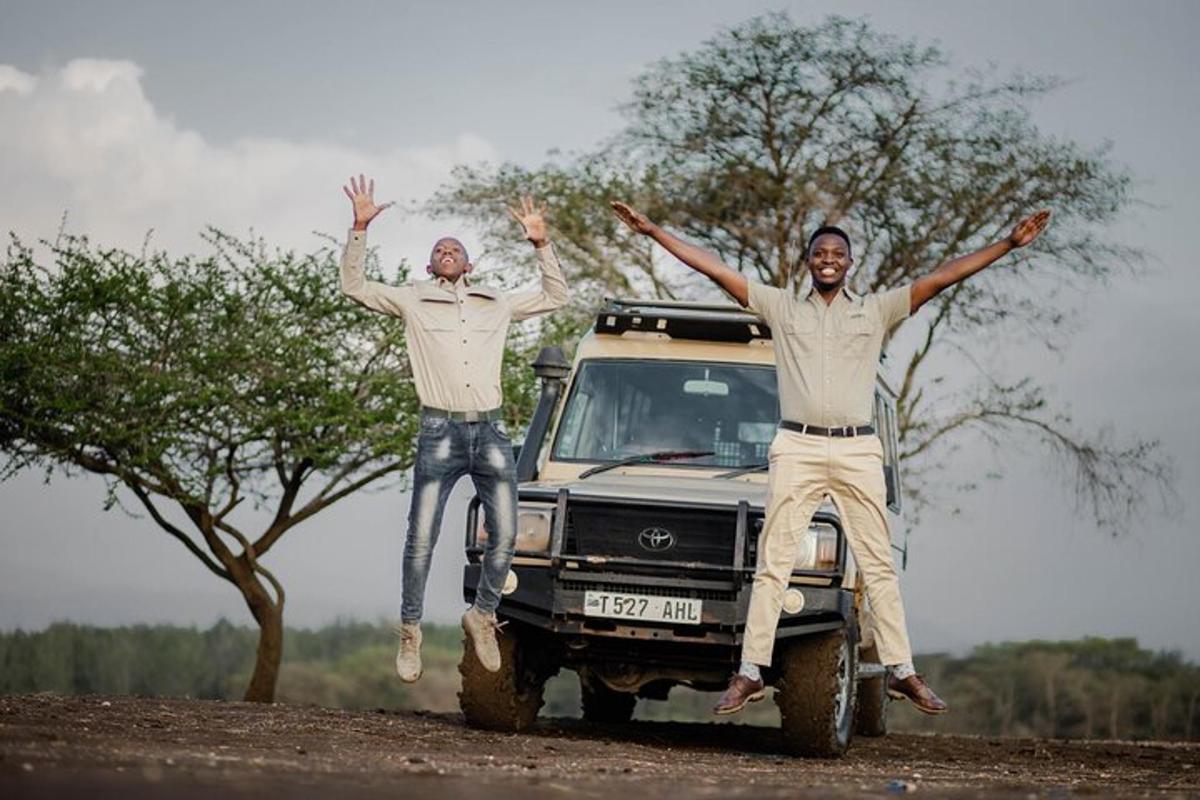 two men jumping off the back of a truck