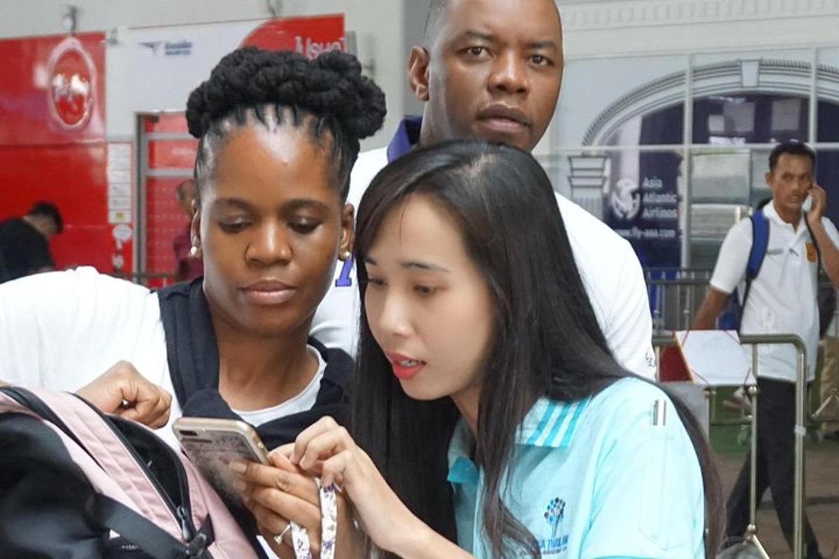 a young girl looking at a cell phone