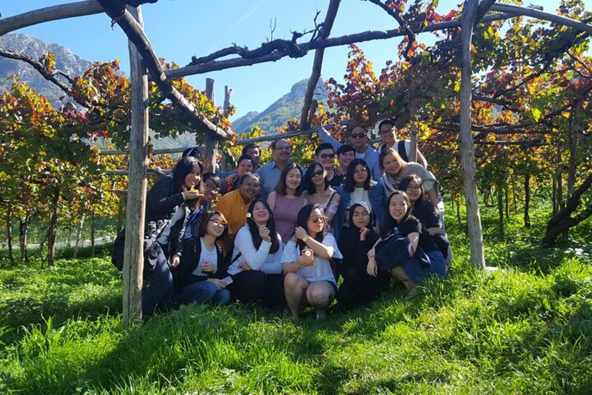 a group of people are posing for a picture